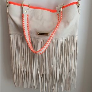White and hot pink leather purse with fringe
